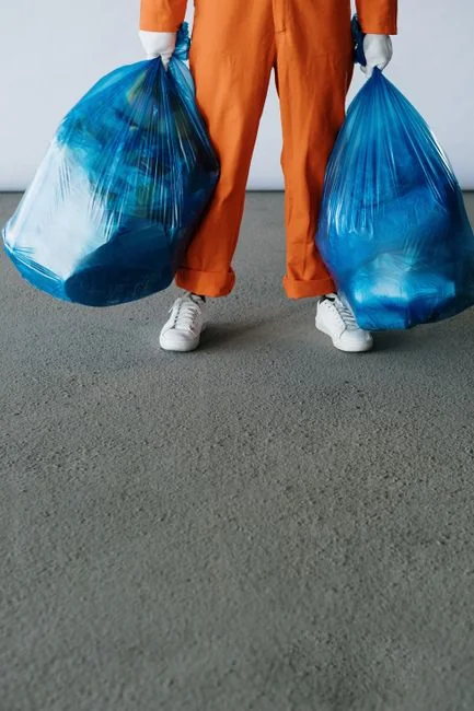 hero-img Latex gloves and spray detergent placed on table in stylish living room in daytime